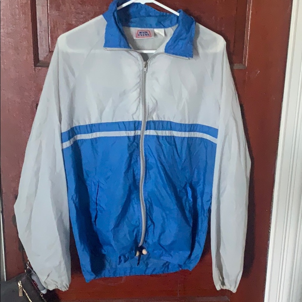 grey and blue windbreaker
